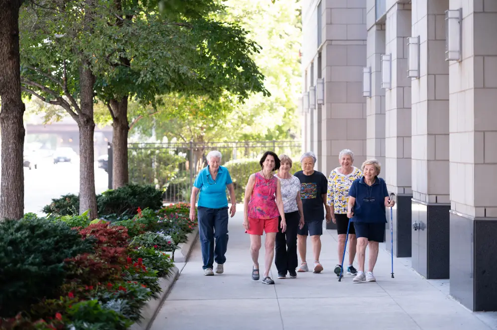 residents at Admiral at the Lake taking a walk